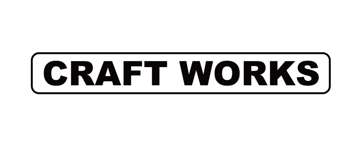 白い背景に黒い太字で「CRAFT WORKS」と書かれた、角丸の長方形の枠で囲まれたシンプルなロゴ画像です。